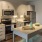 a kitchen with a table and oven