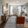 a living room with a couch and chairs
