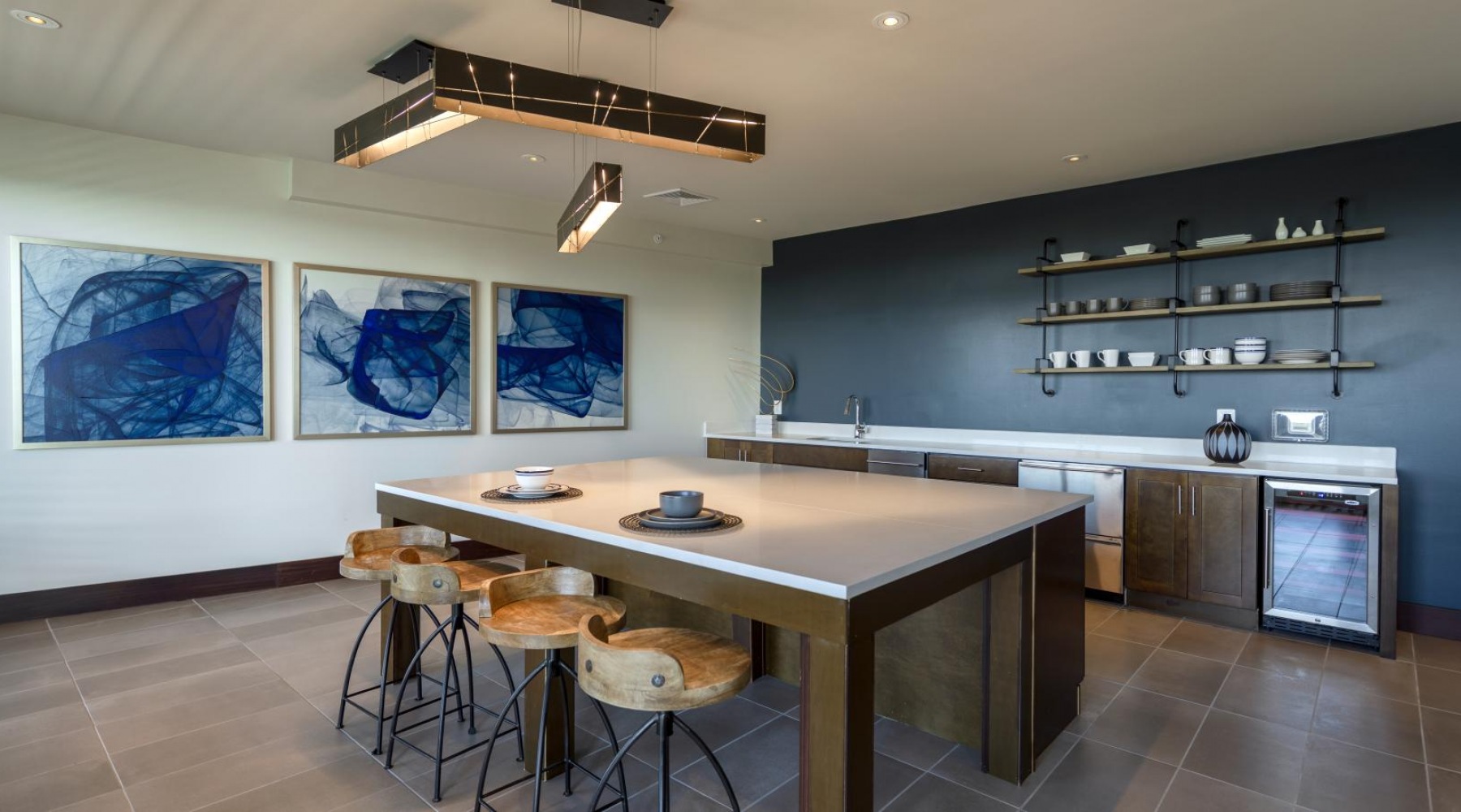 A perfect fit for the whole family lounge area with a kitchen and ample seating