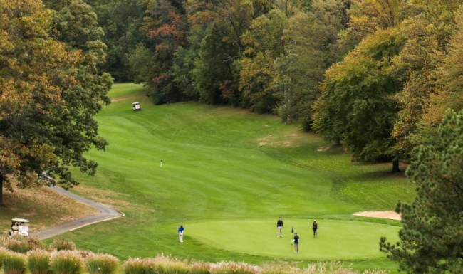 Find your perfect fit at Vy Reston Heights a group of people playing golf