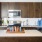 a kitchen with wooden cabinets