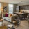 a large kitchen with a couch and a dining table
