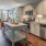 a kitchen with a table and chairs