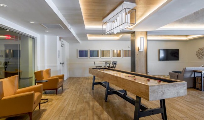 The essence of exceptional living a room with a table and chairs