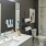 a bathroom with a tub sink and toilet